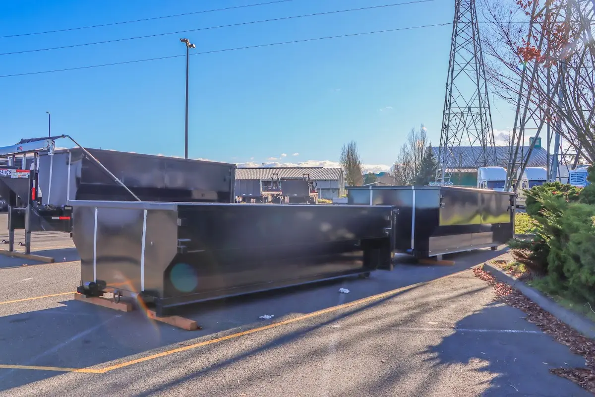 Roll-off dumpster ready for waste disposal at job site for Construction Dumpster Rental in Temple